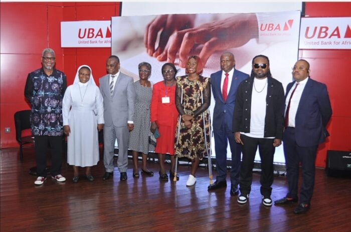 L-R: Past-Chairman, Anglo-Nigerian Welfare Association for the Blind(ANWAB), Ogie Eboigbe; Tutor, Pacelli School of the Blind, Sister Christiana Ekechukwu; Board Member, ANWAB, David Okon; Chairman, ANWAB, Ms Barbara Wey; Official, Ministry of Education, Grace Abimbola; Former, Senior Special Assistant to the Lagos State Governor on Persons Living with Disability, Adenike Oyetunde-Lawal; Executive Director, Finance and Risk Management, United Bank for Africa(UBA), Ugochukwu Nwaghodoh; Nigerian Musician and Producer, Cobhams Asuquo; and Executive Director, Group Operations, UBA, Alex Alozie, during the launch of Braille Account Opening Form for virtually impaired people, held in Lagos on Tuesday