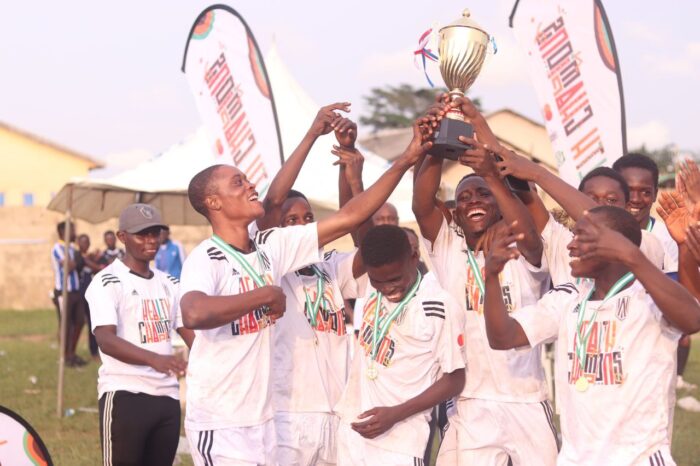 Zion FC of Agege, winners of the inaugural Nigeria Health Champions Cup, celebrating with their trophy