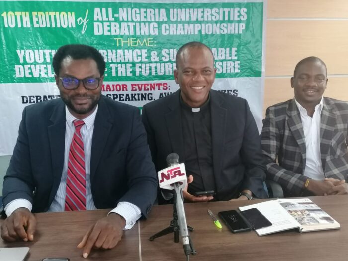 L-R: Chairman of the Local Organising Committee (LOC), Dr Victor Odoeme; Rev. Fr. Dr Martin Onukwuba, Director of Development, Veritas University and Mr Edi Monkpe, Student Union President (SUG), Veritas University, during a news conference on the National Debating Championship, in Abuja on Tuesday