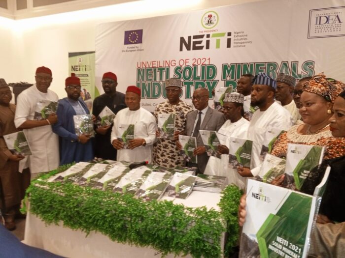 Dr Maurice Mbaeri, Permanent Secretary, General Services Office, SGF (5th left), Dr Orji Ogbonnaya Orji, Executive Secretary NEITI (5th right) with National assembly members CSOs, development partners at the unveiling of 2021 solid minerals reports in Abuja