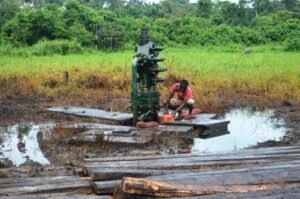 Spilled crude oil in an oil community