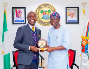 L-R: President and Chairman of Governing Council, Chartered Institute of Personnel Management (CIPM), Mr Olusegun Mojeed receiving a plaque from Gov. Babajide Sanwo-Olu of Lagos during a courtesy visit at the Lagos House, Marina, on Tuesday.