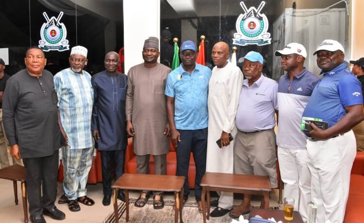 Retired Maj.-Gen. Godwin Umelo (In blue middle) during an 18-hole Retirement Kitty organised in his honour at the TYB International Golf Resort and Country Club, Abuja on Sunday. (Photo Credit: NAN)