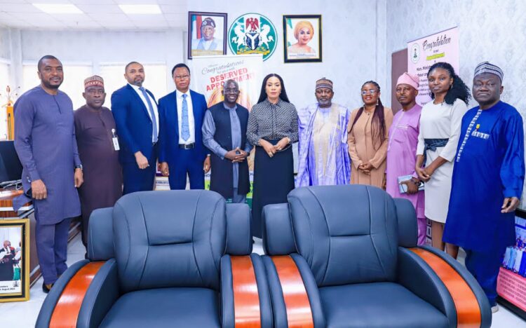 Sixth from left, Minister of State for Labour and Employment, Nkeiruka Onyejeocha and the officials of the ministry and Nigeria Employers’ Consultative Association (NECA)