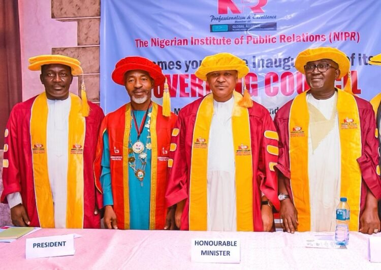 L-R: Vice President Nigerian Institute of Public Relations Prof. Emmanuel Dandaura; President of the Institute, Dr Ike Neliaku; Minister of Information and National Orientation, Mohammed Idris and past President of the Institute, Alhaji Mukhtar Sirajo, during the inauguration of the Governing Council of the NIPR by the Minister in Abuja on Tuesday