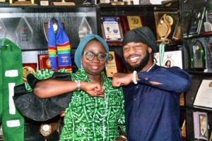 Mrs Abike Dabiri-Erewa, Chairman, Nigerians in Diaspora Commission (NiDCOM) with Rapheal Igbokwe, a Nigerian-U.S. boxing champion