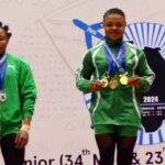 Team Nigeria weightlifters, Rafiatu Folashade Lawal (Right) and Adijat Adenike Olarinoye (Left)