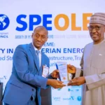 Group CEO, NNPC Ltd., Mr Mele Kyari receives a plaque in appreciation of his role as the Keynote Speaker during the 2024 edition of Society of Petroleum Engineers Oloibiri Lecture Series and Energy Forum (SPE OLEF) held in Abuja, on Thursday