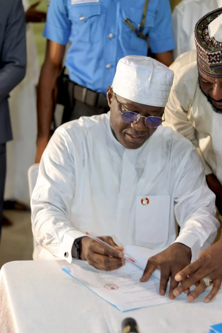 The Federal Commissioner, NCFRMI, Alhaji Tijani Ahmed signing MoU with Nasarawa State University, Keffi on the establishment of International Centre of Excellence for Migration and Humanitarian Development Studies in Keffi on Thursday