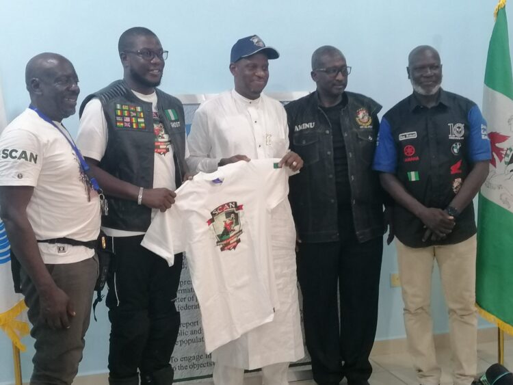 NAN MD, Ali Muhammad Ali (middle), President, Superbike Club Association of Nigeria (SCAN), Usaini Massari and BoT members of the association during a courtesy visit to NAN in Abuja