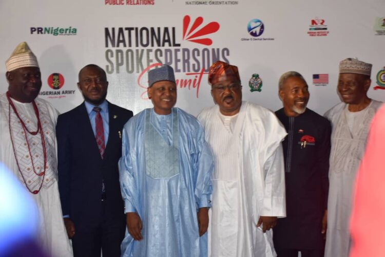 From left: President and Chairman of Council, Nigerian Institute of Public Relations, Dr Ike Neliaku; representative of Chairman, Nigerian Governors Forum and Governor of Kwara State, Mr Kayde Alabi; representative of the Vice President, Mr Stanley Nkwocha and the Minister of Information and National Orientation, Alhaji Mohammed Idris, during the National Spokesperson Summit in Abuja on Tuesday (26/3/24). Albert Otu/NAN