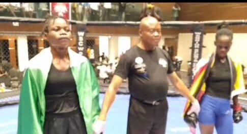 Nigeria’s female fighting sensation Cpl Juliet Ukah of Police College Ikeja FHQ defeats Eunice Akello of Uganda to extend her unbeaten record in Mixed Martial Arts (MMA) at the Enugu Mega Cage Fight event on Sunday night.(Photo Credit:NAN)