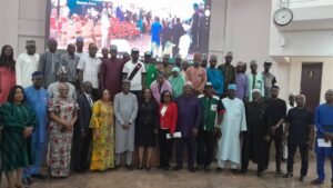 Some Federal Government officials and beneficiaries of FG’s empowerment programme on Monday in Abuja