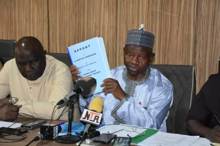 L-R: Secretary General of the Nigeria Olympic Committee (NOC), Tunde Popoola and the President of NOC, Habu Gumel, receiving the reports of committees on its constitution review and the refurbishment of sports infrastructure