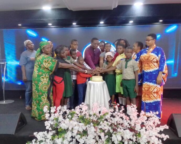 Cleric empowers widows, students with cash gifts