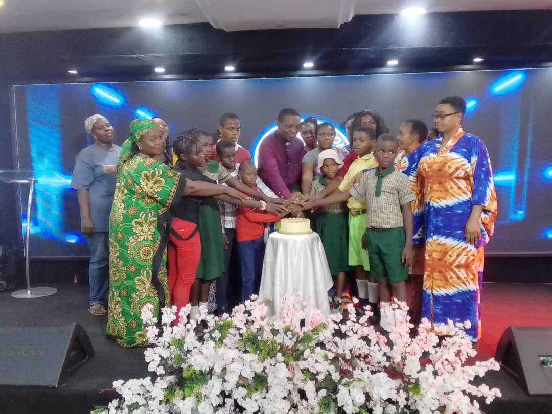 Cleric empowers widows, students with cash gifts