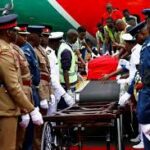 Mourners storm Kenyan airport to receive Odinga’s body