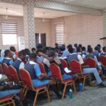 Corps member gives back, trains students on AI