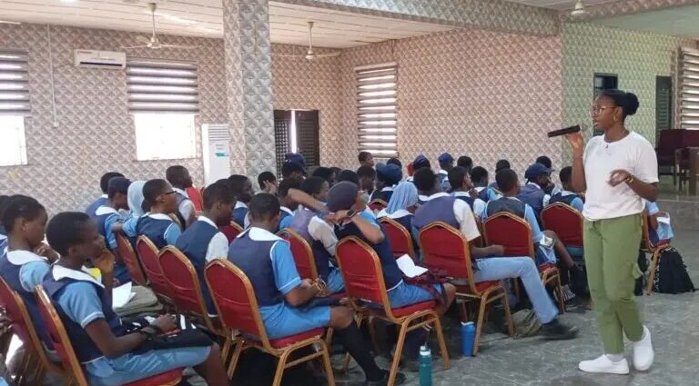 Corps member gives back, trains students on AI
