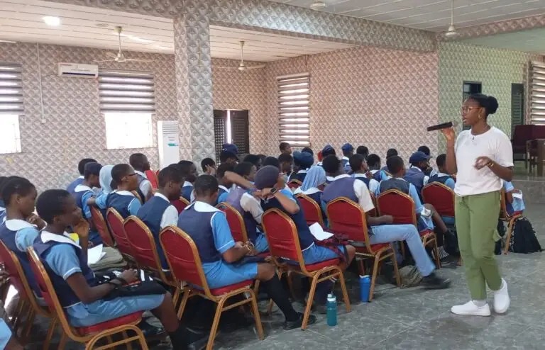 Corps member gives back, trains students on AI