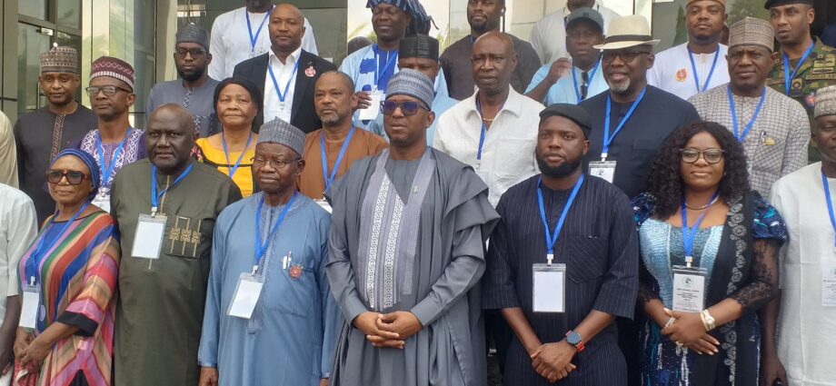 Chairman of the National Sports Commission (NSC), Malam Shehu Dikko (Middle), flanked on his right by Habu Gumel, President, Nigeria Olympic Committee (NOC) and presidents of Sports Federations, during the 3035 NOC Annual General Meeting in Abuja