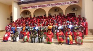 Participants and dignitarries at at the combined graduation ceremony for Batch 3 Information and Communication Technology trainees and Batch 2 Fashion Design trainees of the Nigerian Army Officers’ Wives Association (NAOWA) Youth Empowerment Project for 2025, on Wednesday in Abuja