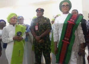 From Left: The President of DEPOWA, Mrs Mernan Femi-Oluyede, the Chief of Administration (Army), Maj.-Gen. Isa Abdullahi, who represented the Chief of Army Staff, and the President of NAOWA, Mrs Safiyyah Shaibu, at the unveiling of NAOWA Computer-Based Test Centre, dining and students' preparatory halls at NAOWA College, Abuja on Wednesday