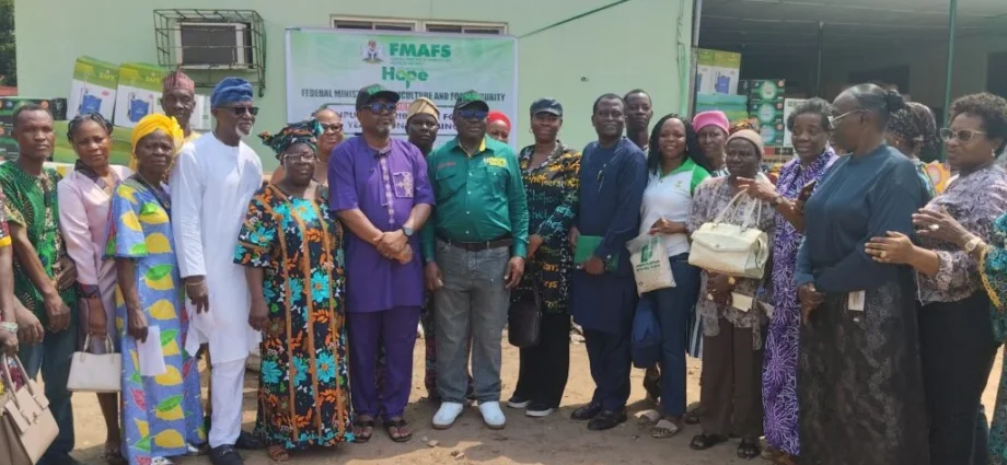 A cross section of Farmer Beneficiaries with the Permanent Secretary Federal Ministry of Agriculture and Food Security,Dr Marcus Ogunbiyi at Agege on Thursday