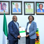 The Managing Director of SeaSeisGeophysical Limited, Mr Goke Adeniyi and Commission Chief Executive, NUPRC, Mrs Oritsemeyiwa Eyesan, after the agreement signing in Abuja on Wednesday