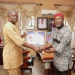 Ven. Dr Ferguson Ezeokafor, the new Deputy Rector, Fed Poly Oko, being honoured by the Alumni President, Nze Henry Nnebe during the courtesy visit.