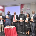 L-R: Gbolahan Bello, Managing Director, Calyx Securities Ltd; Prof. Akpan Ekpo, Chairman, Centre for Financial Journalism; Otunba Kelvin Dele Oye, Chairman of the occasion/former President, NACCIMA; Barr. Bola Ashaolu, Chief Presenter of the book, "Pathways to Nigeria's Socio-Economic Transformation"; Prof. Nnanyelugo Ike-Muonso, Guest lecturer and Director General/CEO, Raw Materials Research and Development Council; Adedayo Olukoya, Director, Bank Examination Department, Nigeria Deposit Insurance Corporation (NDIC); Usman Okpanachi, Director, Statistics, Central Bank of Nigeria, and Kasimu Garba Kurfi, Managing Director and Chief Executive Officer of APT Securities and Funds Limited, during the Bullion Lecture 2026, organised by Centre for Financial Journalism, in Lagos, on Thursday