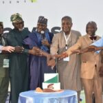 Minister of State for Agricultural and food Security, Dr Aliyu Abdullahi; Executive Director/ Chief Executive Officer, Nigerian Stored Products Research Institute (NSPRI), Prof. Lateef Sanni; and the Chairman, Senate Committee on Agric Colleges and Institutions, Sen. Sarafadeen Alli, during the 2026 Post Harvest Connect, Root, Tuber and Banana Conference in Abuja on Thursday