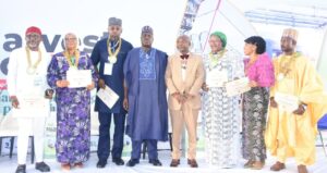 Minister of State for Agricultural and food Security, Dr Aliyu Abdullahi (M); Executive Director/ Chief Executive Officer, Nigerian Stored Products Research Institute (NSPRI), Prof. Lateef Sanni(2nd R); Chairman, Senate Committee on Agric Colleges and Institutions, Sen. Sarafadeen Alli(R) and others, during the 2026 Post Harvest Connect, Root, Tuber and Banana Conference in Abuja on Thursday