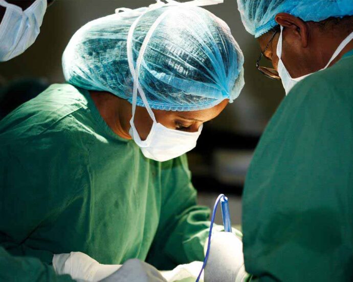 For illustration: Doctors in a surgery room