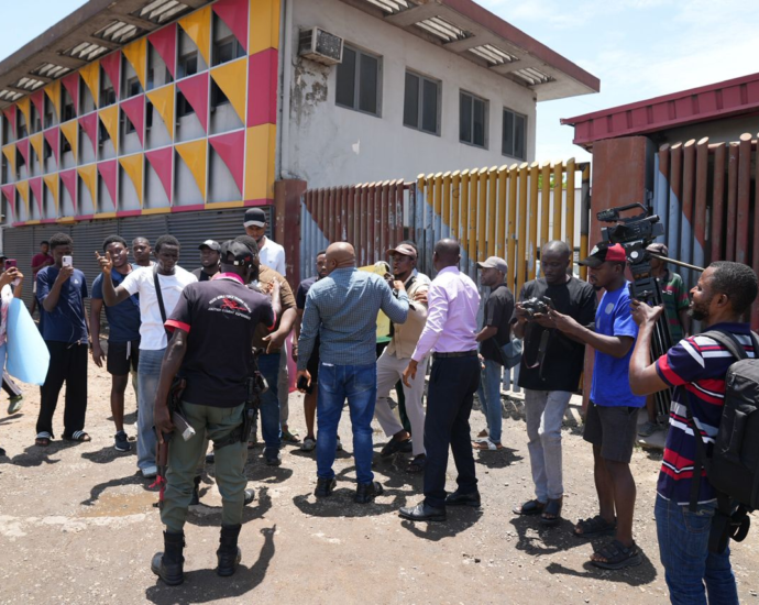 Peaceful protesters at Ikeja Electric (IE) office in Lagos