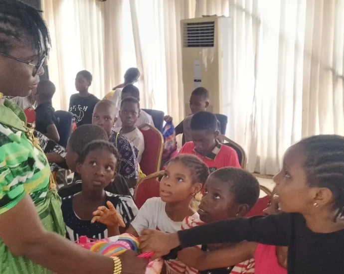 Children receiving gifts from the founder of Cute Kids Haven Foundation, to commemorate the 2026 Children’s Day.