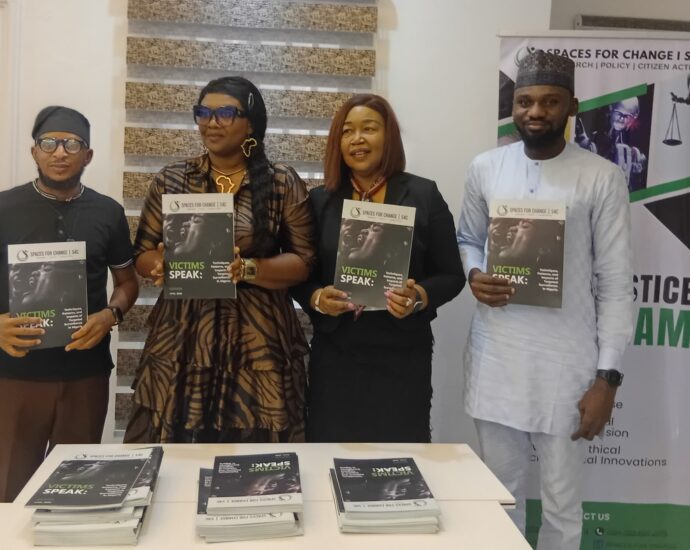Mrs Victoria Ibezim-Ohaeri, Executive Director, Spaces For Change (2nd from left); Justice Nkem Izuakor, a retired Judge (3rd from left), with civil society actors during the unveiling of the report titled “Victims Speak: Techniques, Patterns and Impacts of Targeted Surveillance in Nigeria” in Abuja.