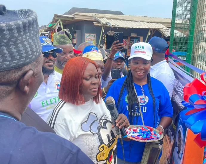 Residents of Eletu Royal Estate, Community Development Authority (CDA), Isheri Oshu, Lagos, and dignitaries, on Saturday, at the inauguration of a N90 million electricity project and a N300 million road project.