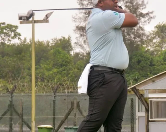 Captain Michael Chidi (MC) Ukaegbu, Captain of Bonny Island Golf Club (BIGC) tees off during a 50th Birthday/Inaugural Golf Tournament organised his honour at the BIGC in Bonny, Rivers State.(PhotoCredit:NAN)