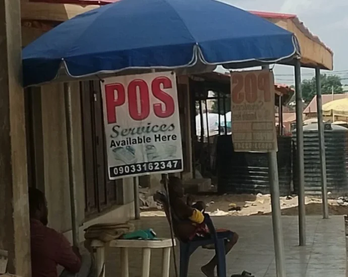 A POS operator in Gwagwalada community, FCT.