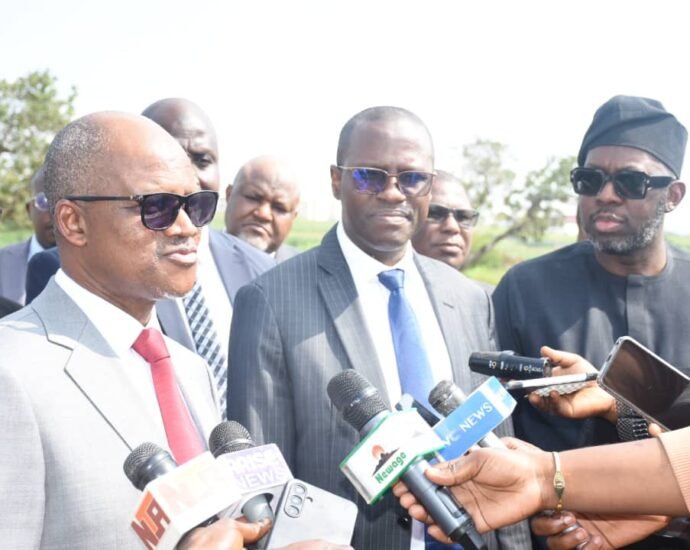 The Chairman of ICPC, Dr Musa Aliyu, SAN (2nd left) with The Managing Director of the FMBN, Mr Shehu Osidi, (1st right) and others during the handing over of 27.92 hectares of forfeited land linked to a diverted 65 million dollars housing project to the Federal Mortgage Bank of Nigeria, on Tuesday in Abuja