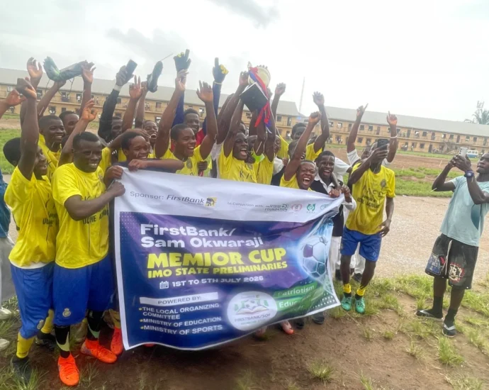 Students of Eziachi Secondary School, Orlu in Imo, lifting the trophy following their victory at the preliminary stage of the First Bank Sam Okwaraji Nigeria U-16 Secondary Schools Football Championship, in Owerri, on Tuesday.