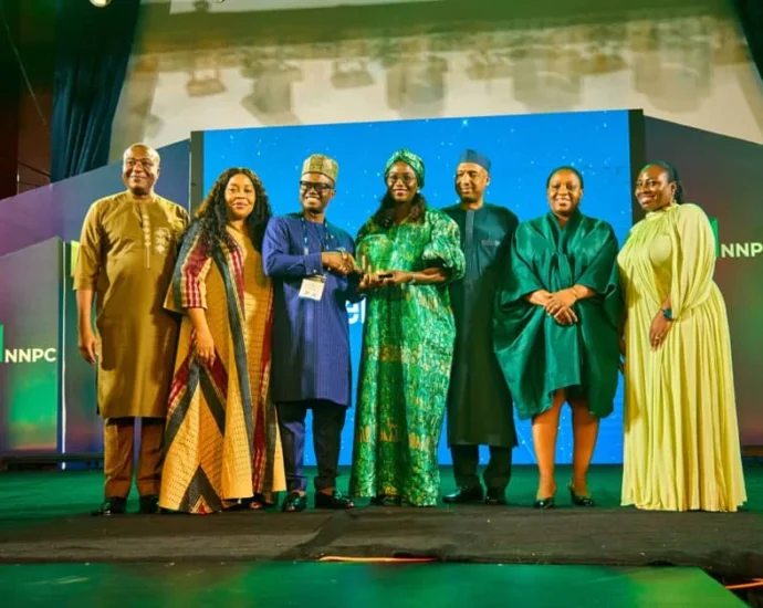 Joseph Mordi, General Manager, Wells & Geoscience Operations, Shell Nigeria Exploration and Production Company Limited (SNEPCo), alongside other Shell leaders, receives an award from the Special Adviser to the President on Energy, Olu Verheijen, during the NNPC Awards Night and Dinner at the 2026 Nigeria Oil and Gas (NOG) Conference and Exhibition in Abuja.