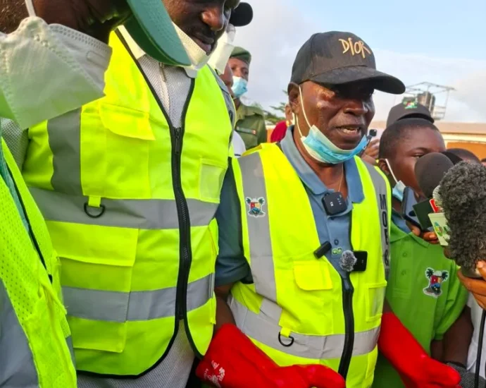 L-R: Special Adviser on the Environment, Olakunle Rotimi-Akodu and Badagry Local Government chairman, Babatunde Hunpe, during a community cleanup exercise in Badagry