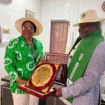 LGAN President Dr Lami Ahmed presenting an award of excellence to Brig. Gen G.G. Shipi (Rtd),the Special Adviser on Security and Homeland Safety to the Plateau State Governor, Caleb Mutfwang and Coordinator of Operation Rainbow, during a courtesy visit by the LGAN delegation to his office in Jos.(PhotoCredit:NAN)