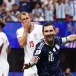 Messi celebrating Argentina's defeat of England in a semifinal match at 2026 FIFA World Cup