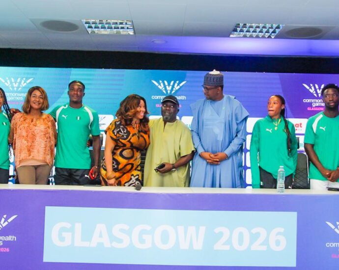 Fourth from left. Chichi Nwoko. Chief Executive Officer of Top Tier Sports Management and representative of What Network; DG of National Sport Commission, Bukola Olapade and Chairman, National Sports Commission, Malam Shehu Dikko, with athletes, during the news conference