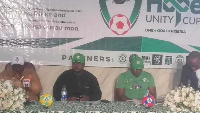 L-R: Mohammed Rabiu, Director, Facilities, NSC and representative of NSC Chairman, Shehu Dikko; Mohammed Saidu, representing NFF President; Suileman Kwande, Convener, Renewed Hope Unity Cup and Victor Iroele, former FCT SWAN Chairman, at the unveiling of the tournament in Abuja