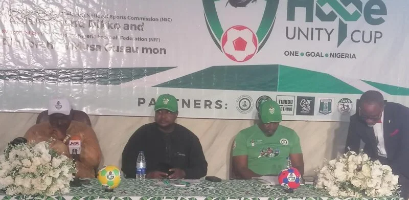L-R: Mohammed Rabiu, Director, Facilities, NSC and representative of NSC Chairman, Shehu Dikko; Mohammed Saidu, representing NFF President; Suileman Kwande, Convener, Renewed Hope Unity Cup and Victor Iroele, former FCT SWAN Chairman, at the unveiling of the tournament in Abuja