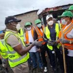 Permanent Secretary, Public Service Office, Mrs Sukanmi Oyegbola (black long sleeve) during the environmental sanitation on Saturday